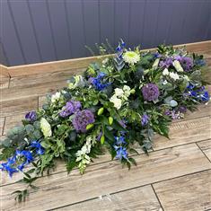 Wild flower coffin spray